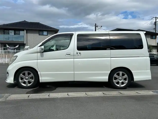 日産 エルグランド XL 静岡県 2007(平19)年 9.7万km 白 純正ＤＶＤナビ/後席モニター/バックカメラ/ＥＴＣ/ＴＶ/ダブルオートエアコン/両側パワースライドドア/ステップ/純正フロアマット/スペアキー１本/ウォークスルー/オートライト/パワーステアリング/パワーウィンドウ/３列シート/ABS