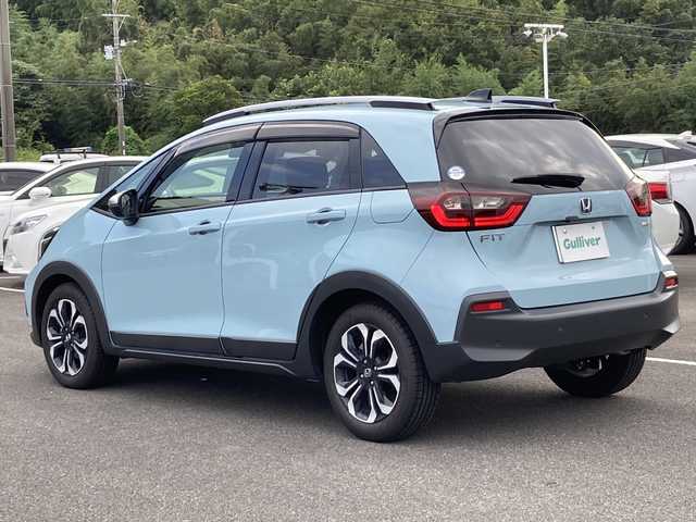 ホンダ フィット e:HEVクロスター 佐賀県 2020(令2)年 7.5万km サーフブルー Gathersナビ/バックカメラ/衝突被害軽減ブレーキ/路線逸脱警報/オートハイビーム/アダプティブクルーズコントロール/コーナーセンサー/電動パーキングブレーキ/オートブレーキホールド/ETC/ステアリングリモコン/プッシュスタート/ドライブレコーダー/LEDヘッドライト/ルーフレール/純正アルミホイール