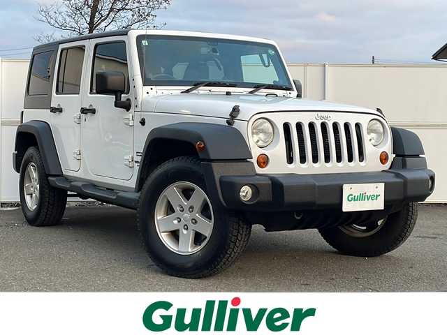 クライスラー・ジープ ジープ ラングラー アンリミテッド スポーツ 岩手県 2013(平25)年 11.1万km 白 ナビ　バックカメラ　サイドカメラ　ＣＤ／ＤＶＤ再生　フルセグ　ＥＴＣ　クルーズコントロール　純正１７ＡＷ　リモコンキー　純正フロアマット　ダウンヒルアシスト　背面タイヤ　スペアキー　ＭＴモード付ＡＴ