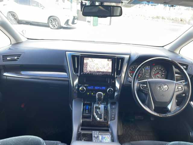 トヨタ ヴェルファイア Z Gエディション 道央・札幌 2016(平28)年 7.5万km ホワイトパールクリスタルシャイン 1オーナー/4WD/社外フリップダウンモニター/社外9型SDナビ/フルセグTV/【CD/DVD/Bluetooth】/バックカメラ/ETC/ドライブレコーダー/クルーズコントロール/ステアリングヒーター/両側パワースライドドア/パワーバックドア/ハーフレザーシート/1列目/2列目パワーシート/オートライト/LEDヘッドランプ/LEDフロントフォグランプ/235/50R18インチ純正AW/プッシュスタート/スマートキー/スペアキー/フロアマット