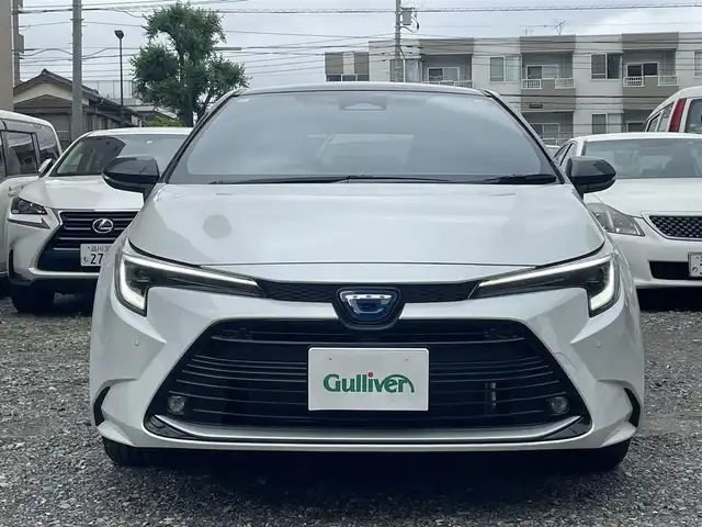 トヨタ カローラツーリング ハイブリッド ダブルバイビー 東京都 2023(令5)年 0.1万km アティチュードブラックマイカ/プラチナホワイトパールマイカ 走行距離770Km/ワンオーナー/純正メモリナビ/ (フルセグTV/Bluetooth/MSV)/バックカメラ/ビルトイン2.0ETC/ハーフレザーシート/TOYOTA Safety Sense/・レーダークルーズ コントロール/・プリクラッシュセーフティ/・レーントレーシングアシスト/・レーンディパーチャーアラート/・ロードサインアシスト/・先行車発進告知機能/・オートマチックハイビーム/プライインドスポットモニター/横滑り防止機能/純正17インチアルミホイール/スマートキー/純正LEDヘッドライト/カーテンエアバック/スペアキー1本/保証書/取扱説明書