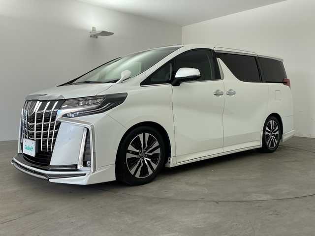 トヨタ アルファード S Cパッケージ 兵庫県 2021(令3)年 2.6万km ホワイトパールクリスタルシャイン ・Wサンルーフ/・社外エアロ/・社外4本出しマフラー/・ダウンサス/・トヨタセーフティーセンス/・プリクラッシュセーフティ/・レーントレーシングアシスト/・クリアランスソナー/・パーキングサポートブレーキ/・リヤクロストラフィックアラート/・BSM/・ロードサインアシスト/・ナノイー/・レーダークルーズコントロール/・オートマチックハイビーム/・純正9型ナビ＆フルセグ＆BT＆USB＆DVD/・バックカメラ/・純正12.1型フリップダウンモニター/・両側パワースライドドア/・パワーバックドア/・ビルトインETC2.0/・ステアリングヒーター/・ステアリングリモコン/・デジタルインナーミラー/・社外前後ドライブレコーダー/・合皮シート/・前席シートヒーター/・前席シートベンチレーション/・運転席メモリーシート/・2列目オットマン/・助手席オットマン/・3眼LEDヘッドライト/・フォグ/・オートライト/・スマートキー/・スペアキー/・プッシュスタート/・電子パーキング/・オートホールド/・純正18インチアルミホイール