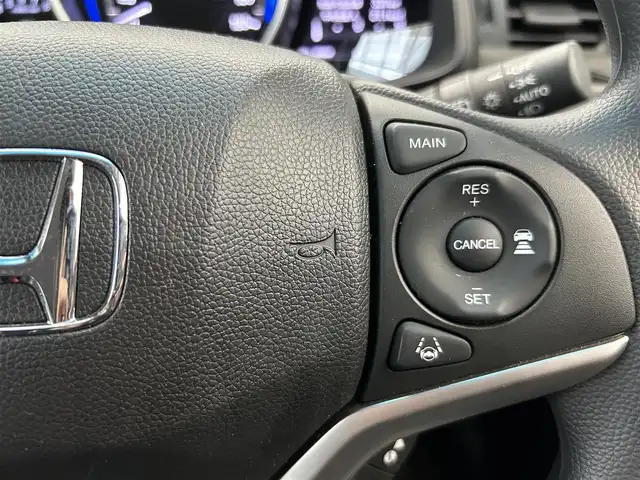 ホンダ フィット 13G L ホンダセンシング 鹿児島県 2018(平30)年 1.1万km プレミアムホワイトパールⅡ 社外オーディオ/Honda SENSING/　・衝突軽減ブレーキ/　・アダプティブクルーズコントロール/　・誤発進抑制機能/　・歩行者事故低減ステアリング/　・ＬＫＡＳ/　・先行車発進お知らせ機能/　・標識認識機能/電動格納ミラー/ＬＥＤヘッドライト/フォグライト/オートライト