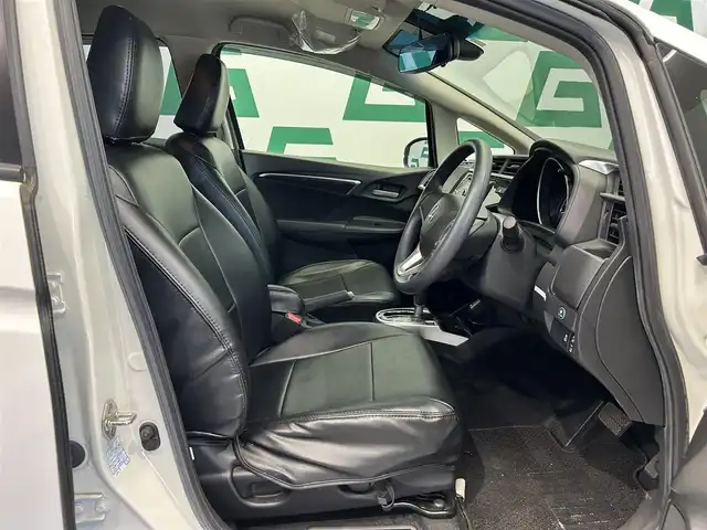 ホンダ フィット 13G L ホンダセンシング 鹿児島県 2018(平30)年 1.1万km プレミアムホワイトパールⅡ 社外オーディオ/Honda SENSING/　・衝突軽減ブレーキ/　・アダプティブクルーズコントロール/　・誤発進抑制機能/　・歩行者事故低減ステアリング/　・ＬＫＡＳ/　・先行車発進お知らせ機能/　・標識認識機能/電動格納ミラー/ＬＥＤヘッドライト/フォグライト/オートライト