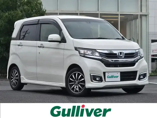 ホンダ Ｎ ＷＧＮ カスタム G SSパッケージ 鹿児島県 2018(平30)年 2.1万km プレミアムホワイトパールⅡ クルーズコントロール　/ビルトインＥＴＣ　/前後ドライブレコーダー　/純正ＳＤナビ（ＶＸＭ－１８４ＶＦｉ）　/Ｂｌｕｅｔｏｏｔｈオーディオ　/バックカメラ　/フルセグテレビ　/ハーフレザーシート　/ＬＥＤヘッドライト/純正アルミホイール(14インチ)/プッシュスタート/スマートキー/横滑り防止装置/エアバッグ(W+サイド)/カーテンエアバッグ