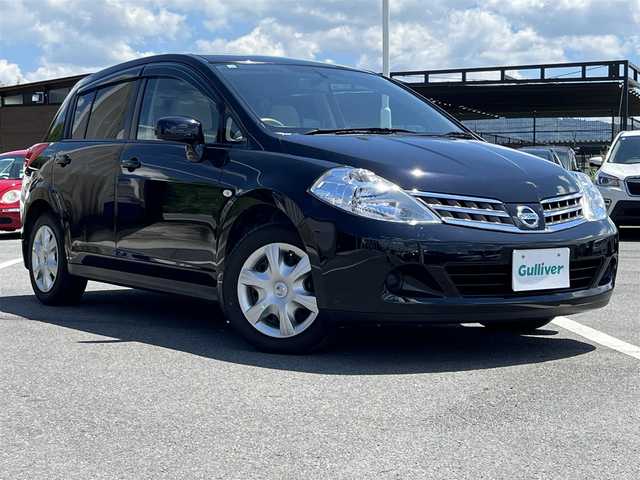 日産 ティーダ 15M SV +プラズマ 奈良県 2011(平23)年 3.4万km サファイアブラック 純正ナビ/フルセグ/DVD/Bluetooth/純正フロアマット/ハーフレザーシート/オートライト/取扱説明書/スペアキー1本