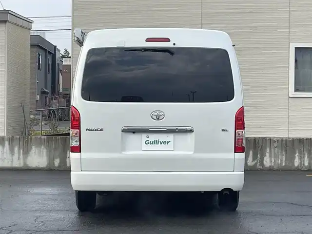 トヨタ ハイエース GL 青森県 2018(平30)年 9.5万km ホワイトパールクリスタルシャイン 4WD/ワンオーナー/モデリスタエアロ　/キャンピング仕様/ベッドキッド/タープ/シンク/フローリング/後席回転対座シート/後席TVモニター有（HDMI用）/WAC/片側パワースライドドア/社外ナビ/・フルセグ/AM/FM/CD/DVD/BT/純正フロアマット/センターコンソール/車線逸脱警報/横滑り防止機能/ヒルスタートアシスト/UVカットガラス/プライバシーガラス/盗難防止装置/オートライト/ETC/スペアキー/純正スターター/保証書/取扱説明書
