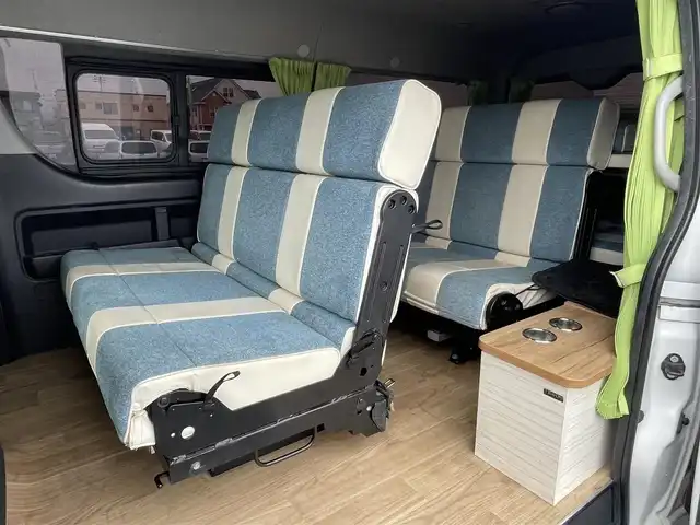 トヨタ ハイエース GL 青森県 2018(平30)年 9.5万km ホワイトパールクリスタルシャイン 4WD/ワンオーナー/モデリスタエアロ　/キャンピング仕様/ベッドキッド/タープ/シンク/フローリング/後席回転対座シート/後席TVモニター有（HDMI用）/WAC/片側パワースライドドア/社外ナビ/・フルセグ/AM/FM/CD/DVD/BT/純正フロアマット/センターコンソール/車線逸脱警報/横滑り防止機能/ヒルスタートアシスト/UVカットガラス/プライバシーガラス/盗難防止装置/オートライト/ETC/スペアキー/純正スターター/保証書/取扱説明書