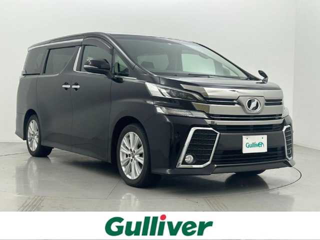 トヨタ ヴェルファイア Z Aエディション 熊本県 2017(平29)年 9.3万km バーニングブラッククリスタルシャインガラスフレーク 禁煙車/アルパインナビ（フルセグ・ＢＴ・ＳＤ・ＣＤ・ＤＶＤ）/アルパイン後席モニター/バックカメラ/ビルトインＥＴＣ　/クルーズコントロール/両側パワースライドドア　/前後クリアランスソナー/横滑り防止/2列目オットマン/純正フロアマット/純正１８インチAW/オートライト/LEDヘッドライト/フォグライト/スマートキー/プッシュスタート/スペアキー1本/保証書/取扱説明書