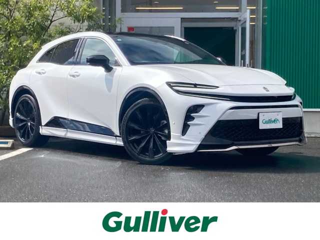 トヨタ クラウン スポーツ Z 岡山県 2025(令7)年 0.1万km未満 プレシャスホワイトパール 純正12.3インチHDディスプレイ/フルセグTV、AM、FM、/Apple Carplay、Android Auto/パノラマルーフ/ビルトインETC2.0/モデリスタフルエアロ/デジタルインナーミラー/メモリーシート/ドライブレコーダー/置くだけ充電/アクセサリーコンセント/茶革シート/前席シートヒーター/前席シートベンチレーション/ハンズフリーパワーバックドア/パノラミックビューモニター/パーキングサポートブレーキ/トヨタチームメイト/・アドバンスドパーク/・アドバンスドドライブ/トヨタセーフティセンス/・プリクラッシュセーフティ/・緊急時操舵支援/・フロントクロストラフィックアラート/・レーンチェンジアシスト/・レーントレーシングアシスト/・レーダークルーズコントロール/・アダブティブハイビームシステム/・ロードサインアシスト/・ドライバー異常時対応システム/・プロアクティブドライビングシステム/・発進遅れ告知機能/ブラインドスポットモニター/AC100V