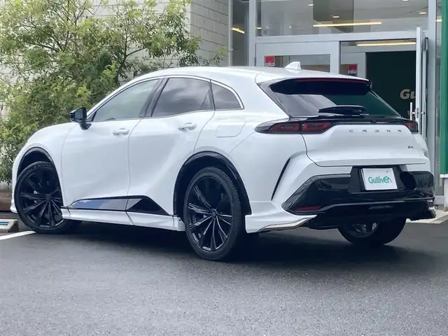 トヨタ クラウン スポーツ Z 岡山県 2025(令7)年 0.1万km未満 プレシャスホワイトパール 純正12.3インチHDディスプレイ/フルセグTV、AM、FM、/Apple Carplay、Android Auto/パノラマルーフ/ビルトインETC2.0/モデリスタフルエアロ/デジタルインナーミラー/メモリーシート/ドライブレコーダー/置くだけ充電/アクセサリーコンセント/茶革シート/前席シートヒーター/前席シートベンチレーション/ハンズフリーパワーバックドア/パノラミックビューモニター/パーキングサポートブレーキ/トヨタチームメイト/・アドバンスドパーク/・アドバンスドドライブ/トヨタセーフティセンス/・プリクラッシュセーフティ/・緊急時操舵支援/・フロントクロストラフィックアラート/・レーンチェンジアシスト/・レーントレーシングアシスト/・レーダークルーズコントロール/・アダブティブハイビームシステム/・ロードサインアシスト/・ドライバー異常時対応システム/・プロアクティブドライビングシステム/・発進遅れ告知機能/ブラインドスポットモニター/AC100V