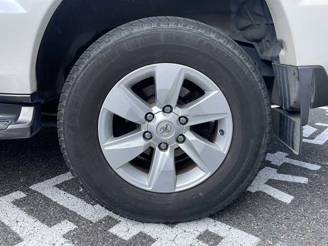 トヨタ ランドクルーザー プラド TZ Gセレクション 広島県 2006(平18)年 15.5万km ホワイトパールクリスタルシャイン /登録時走行距離/　　　　　　　154472キロ/ワンオーナー/メーカーナビ/バックカメラ/ベージュ革シート/シートヒーター/COOL BOX/スペアキー×１/ETC/新車時整備手帳/　　【保証書】/取扱説明書/