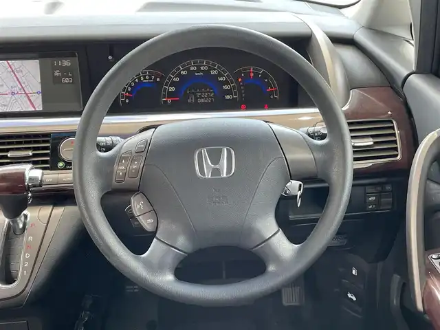 ホンダ エリシオン G Aero HDDナビパッケージ 岡山県 2007(平19)年 8.7万km ブリリアントホワイトパール 登録時走行距離86229km/フリップダウン後席モニター/純正HDDナビ/(AM/FM/DISC/TV)/バックカメラ/ETC/無限フロントグリル/片側パワースライドドア/リモコンキー/スペアキー/純正17インチアルミホイール/パワーウィンドウ/パワーステアリング/記録簿/保証書/取扱説明書