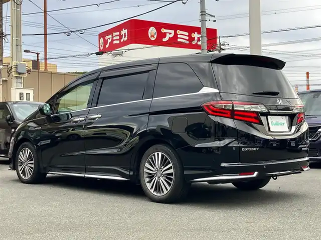 ホンダ オデッセイ ハイブリッド アブソルート・EXホンダセンジング 静岡県 2019(平31)年 8.9万km クリスタルブラックパール エンジンスタートボタン/パワーステアリング/パワーウィンドウ/アイドリングストップ/スマートキー/スペアキー１本/Wオートエアコン/レーダークルーズコントロール/後席モニター/ETC2.0/USB入力端子/全方位カメラ/純正ナビ(CD/DVD/BT/フルセグ)/ドライブレコーダー前後/ウォークスルー/純正フロアマット/D席N席パワーシート/D席N席シートヒーター/両側パワースライドドア/純正アルミホイール/ABS/横滑り防止装置/コーナーセンサー前後/レーンキープアシスト/オートライト/LEDヘッドライト/W+サイドエアバッグ/カーテンエアバッグ/衝突軽減システム/HDMI/BSM/デジタルインナーミラー