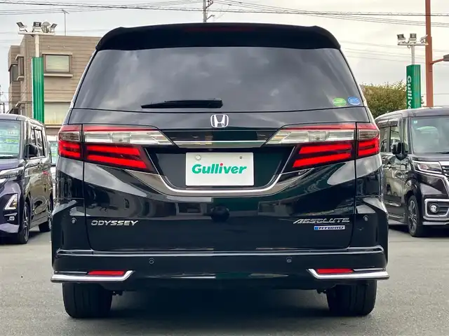 ホンダ オデッセイ ハイブリッド アブソルート・EXホンダセンジング 静岡県 2019(平31)年 8.9万km クリスタルブラックパール エンジンスタートボタン/パワーステアリング/パワーウィンドウ/アイドリングストップ/スマートキー/スペアキー１本/Wオートエアコン/レーダークルーズコントロール/後席モニター/ETC2.0/USB入力端子/全方位カメラ/純正ナビ(CD/DVD/BT/フルセグ)/ドライブレコーダー前後/ウォークスルー/純正フロアマット/D席N席パワーシート/D席N席シートヒーター/両側パワースライドドア/純正アルミホイール/ABS/横滑り防止装置/コーナーセンサー前後/レーンキープアシスト/オートライト/LEDヘッドライト/W+サイドエアバッグ/カーテンエアバッグ/衝突軽減システム/HDMI/BSM/デジタルインナーミラー