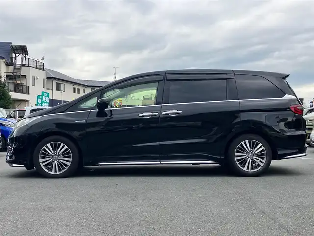 ホンダ オデッセイ ハイブリッド アブソルート・EXホンダセンジング 静岡県 2019(平31)年 8.9万km クリスタルブラックパール エンジンスタートボタン/パワーステアリング/パワーウィンドウ/アイドリングストップ/スマートキー/スペアキー１本/Wオートエアコン/レーダークルーズコントロール/後席モニター/ETC2.0/USB入力端子/全方位カメラ/純正ナビ(CD/DVD/BT/フルセグ)/ドライブレコーダー前後/ウォークスルー/純正フロアマット/D席N席パワーシート/D席N席シートヒーター/両側パワースライドドア/純正アルミホイール/ABS/横滑り防止装置/コーナーセンサー前後/レーンキープアシスト/オートライト/LEDヘッドライト/W+サイドエアバッグ/カーテンエアバッグ/衝突軽減システム/HDMI/BSM/デジタルインナーミラー