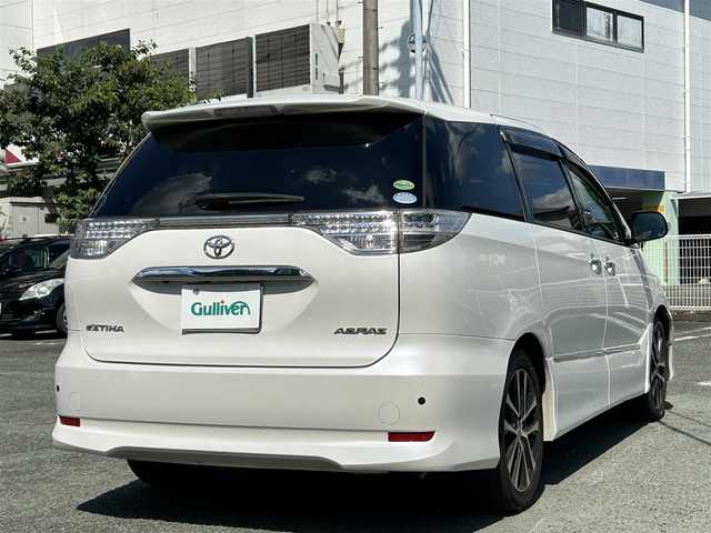 トヨタ エスティマ アエラス プレミアムエディション 熊本県 2013(平25)年 4.5万km ホワイトパールクリスタルシャイン ワンオーナー/プッシュスタート/純正ナビ/（CD・DVD・フルセグTV・BTオーディオ・SD）/バックカメラ/ETC/純正18インチAW/両側パワースライドドア/クルーズコントロール/ハーフレザーシート/右前席パワーシート/HIDヘッドライト/オートライト/フォグライト/前後コーナーセンサー/ウィンカーミラー/純正フロアマット/純正ドアバイザー/新車保証書/取扱説明書/スマートスペアキー×1本