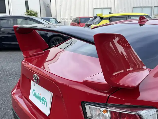 トヨタ ８６ GT エアロパッケージFT 神奈川県 2016(平28)年 11.6万km ピュアレッド BBS製純正18インチAW/純正エアロ/大型リアウィング/純正SDナビ・地デジTV/純正CD/DVD/SD/BT/バックカメラ/ETC/ドライブレコーダー/HIDライト/クルーズコントロール/パドルシフト/プッシュスタート/スマートキー×2/純正フロアマット/取扱説明書/保証書