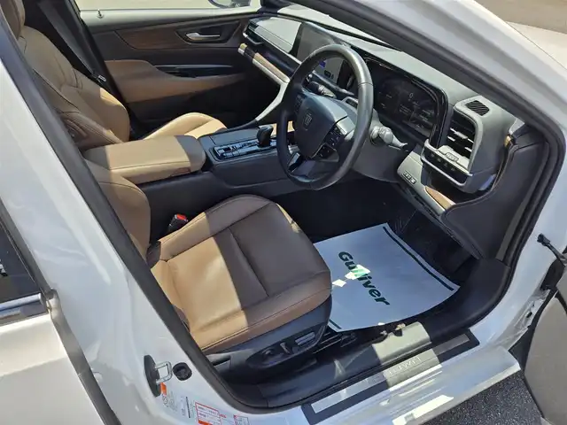トヨタ クラウン Z 鹿児島県 2023(令5)年 4.6万km プレシャスホワイトパール レーダークルーズコントロール　/デジタルインナーミラー　/ブラックパッケージ(OP装備)/パノラマルーフ(OP装備)　/パノラミックビューモニター　/パワーバックドア　/パーキングアシスト　/全席シートヒーター／エアシート　/ステアリングヒーター/肩口パワーシート/純正前後ドライブレコーダー/ビルトインETC2.0/Bluetoothオーディオ/純正アルミホイール(20インチ)/プッシュスタート/スマートキー