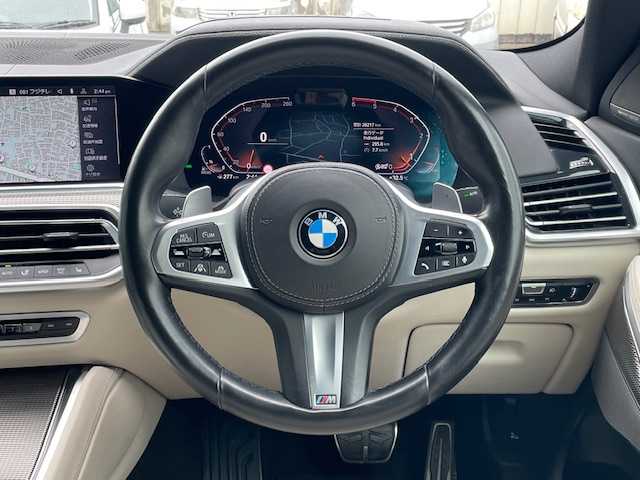 ＢＭＷ Ｘ６ xDrive35d Mスポーツ 東京都 2020(令2)年 2.9万km サファイアブラックP マットブラック　ラッピング/純正ナビ/AM/FM/BT/フルセグ/パーキングアシストプラス/・アクティブパークディスタンスコントロール/・パーキングアシスト/・トップビュー/3Dビュー/・サイドビューカメラ/リアビューカメラ/ドライビングアシストプロフェッショナル/・アクティブクルーズコントロール/・レーンディパーチャウオーニング/・ステアリング/レーンコントロールアシスト/・レーンチェンジウオーニング/・衝突回避/衝突軽減ブレーキ/・アクティブサイドコリジョンプロテクション/・レーンチェンジアシスト/・トラフィックサインアシスト/LEDヘッドライト/スペアキー×1/ヘッドアップディスプレイ/純正22inアルミホイール