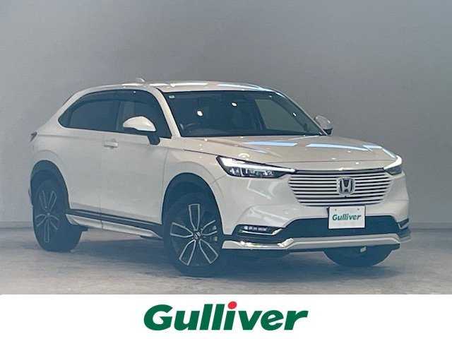 ホンダ ヴェゼル ハイブリッド e:HEV Z 宮城県 2022(令4)年 3.5万km プラチナホワイトパール 純正エアロパーツ（F/S/R)/ホンダセンシング/・レーンキープアシスト/・ブラインドスポットモニター/・衝突軽減システム/・衝突軽減ブレーキ/・横滑り防止装置/純正ナビ/・純正プレミアムオーディオ/・ホンダコネクトディスプレイ（9インチ）/・フルセグTV/・Bluetooth/USB/・2.0ETC/・全方位カメラ/・ドライブレコーダー（前後）/・置くだけ充電/アイドリングストップ/電子パーキング/革巻きステアリング/・ステアリングスイッチ/・パドルシフト/シートヒーター（運転席/助手席）/プッシュスタート/・スマートキー/LEDヘッドライト/・オートライト/・フォグランプ/純正フロアマット/純正アルミホイール18インチ