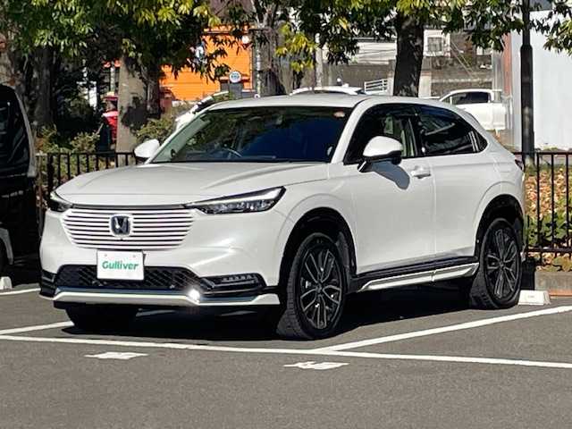 ホンダ ヴェゼル ハイブリッド e:HEV Z 宮城県 2022(令4)年 3.5万km プラチナホワイトパール 純正エアロパーツ（F/S/R)/ホンダセンシング/・レーンキープアシスト/・ブラインドスポットモニター/・衝突軽減システム/・衝突軽減ブレーキ/・横滑り防止装置/純正ナビ/・純正プレミアムオーディオ/・ホンダコネクトディスプレイ（9インチ）/・フルセグTV/・Bluetooth/USB/・2.0ETC/・全方位カメラ/・ドライブレコーダー（前後）/・置くだけ充電/アイドリングストップ/電子パーキング/革巻きステアリング/・ステアリングスイッチ/・パドルシフト/シートヒーター（運転席/助手席）/プッシュスタート/・スマートキー/LEDヘッドライト/・オートライト/・フォグランプ/純正フロアマット/純正アルミホイール18インチ