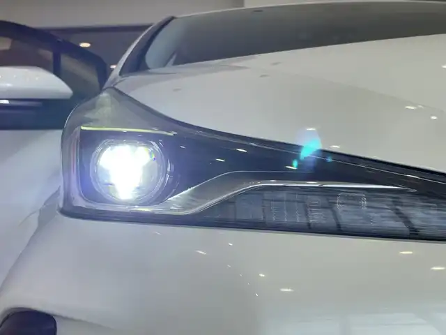 トヨタ プリウス A 長崎県 2019(平31)年 9.3万km ホワイトパールクリスタルシャイン セーフティーセンス/純正9インチSDナビ/　　Bluetooth/DVD/フルセグ/バックカメラ/ETC/LEDオートライト/MODELIISTAフルエアロ/純正15インチアルミホイール/運転席パワーシート/パーキングアシスト/クルーズコントロール