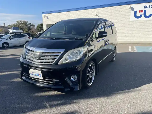 トヨタ アルファード 240S プライムセレクションⅡ 和歌山県 2011(平23)年 12.1万km ブラック (株)IDOMが運営する【じしゃロン和歌山店】の自社ローン対象車両になります。こちらは現金ご利用時の価格です。/自社ローンご希望の方は別途その旨お申付け下さい。/4WD/寒冷地仕様/アルパインナビ/AM/FM/CD/DVD/TV/アルパインフリップダウンナビ/両側パワースライドドア/横滑り抑制装置/クルーズコントロール/パワーバックドア/コーナーセンサー/純正フロアマット/後席オットマン/7人乗り/社外AW20インチ