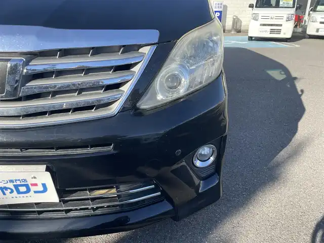 トヨタ アルファード 240S プライムセレクションⅡ 和歌山県 2011(平23)年 12.1万km ブラック (株)IDOMが運営する【じしゃロン和歌山店】の自社ローン対象車両になります。こちらは現金ご利用時の価格です。/自社ローンご希望の方は別途その旨お申付け下さい。/4WD/寒冷地仕様/アルパインナビ/AM/FM/CD/DVD/TV/アルパインフリップダウンナビ/両側パワースライドドア/横滑り抑制装置/クルーズコントロール/パワーバックドア/コーナーセンサー/純正フロアマット/後席オットマン/7人乗り/社外AW20インチ