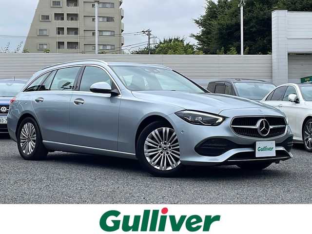 メルセデス・ベンツ Ｃ１８０ ステーションワゴンアバンギャルド 東京都 2022(令4)年 2.3万km ハイテックシルバー レーダーセーフティパッケージ（詳細は検査員記入欄参照）・アダプティブクルーズコントロール/ベーシックパッケージ/3Dコックピッドディスプレイ/ARヘッドアップディスプレイ/ダイナミックセレクト/保証書/取説/スマートキー×２（キーレスゴー）/クライメントコントロール/アイドリングストップ/革巻きステア/電動チルト/ステアリングスイッチ/黒ハーフレザーシート/前メモリ付パワーシート＆シートキネティクス/メルセデスミーコネクト/12.8インチ有機ELメディアディスプレイ/ARナビ・フルセグTV/BT/USB/AppleCarPlay/AndroidAuto/360度カメラシステム・アクティブパーキングアシスト・パークトロニック/2.0ビルトインETC＆外前後ドラレコ＆外レーダー探知機/純正17インチアルミ/LEDパフォーマンスライト・オートライト・リアフォグ/パワーバックドア/AUTOHOLD/置くだけ充電/ルーフレール/トノカバー