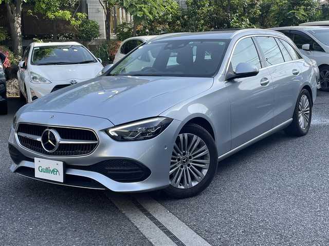 メルセデス・ベンツ Ｃ１８０ ステーションワゴンアバンギャルド 東京都 2022(令4)年 2.3万km ハイテックシルバー レーダーセーフティパッケージ（詳細は検査員記入欄参照）・アダプティブクルーズコントロール/ベーシックパッケージ/3Dコックピッドディスプレイ/ARヘッドアップディスプレイ/ダイナミックセレクト/保証書/取説/スマートキー×２（キーレスゴー）/クライメントコントロール/アイドリングストップ/革巻きステア/電動チルト/ステアリングスイッチ/黒ハーフレザーシート/前メモリ付パワーシート＆シートキネティクス/メルセデスミーコネクト/12.8インチ有機ELメディアディスプレイ/ARナビ・フルセグTV/BT/USB/AppleCarPlay/AndroidAuto/360度カメラシステム・アクティブパーキングアシスト・パークトロニック/2.0ビルトインETC＆外前後ドラレコ＆外レーダー探知機/純正17インチアルミ/LEDパフォーマンスライト・オートライト・リアフォグ/パワーバックドア/AUTOHOLD/置くだけ充電/ルーフレール/トノカバー