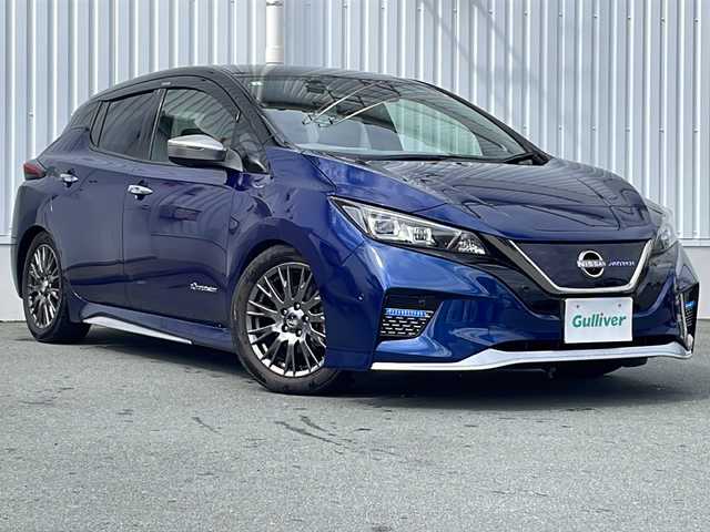日産 リーフ e+ オーテック 三重県 2021(令3)年 3.2万km オーロラフレアブルーパール /スーパーブラック 2トーン 純正ナビ /全周囲カメラ /BOSEサウンド/BSM /デジタルインナーミラー /プロパイロット /ビルトインETC/USB・タイプC給電/レーダークルーズコントロール/レーンキープアシスト/衝突軽減ブレーキ /ステアリングヒーター /革巻きステアリング/ステアリングスイッチ/シートヒーター /前後コーナーセンサー /ミラー型前後ドライブレコーダー/LEDヘッドライト/オートハイビーム/オートライト/電動格納ミラー/禁煙車