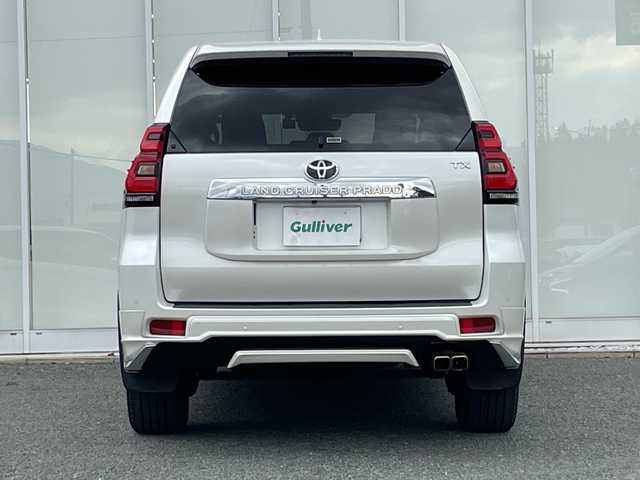 トヨタ ランドクルーザー プラド TX Lパッケージ 福岡県 2021(令3)年 3.6万km ホワイトパールクリスタルシャイン 純正ナビ機能付きディスプレイオーディオ/（AM/FM/USB/BT/Apple CarPlay/フルセグ）/全方位カメラ/モデリスタエアロ（F/S/R)/レーダークルーズコントロール/プリクラッシュセーフティ/ロードサインアシスト/前後コーナーセンサー/レーンキープアシスト/ワンオーナー/ETC2.0/純正フロアマット/レザーシート/D+Nパワーシート/D+N席シートヒーター/エアシート/純正17インチアルミホイール/前後ドライブレコーダー/オートライト/LEDヘッドライト/オートハイビーム