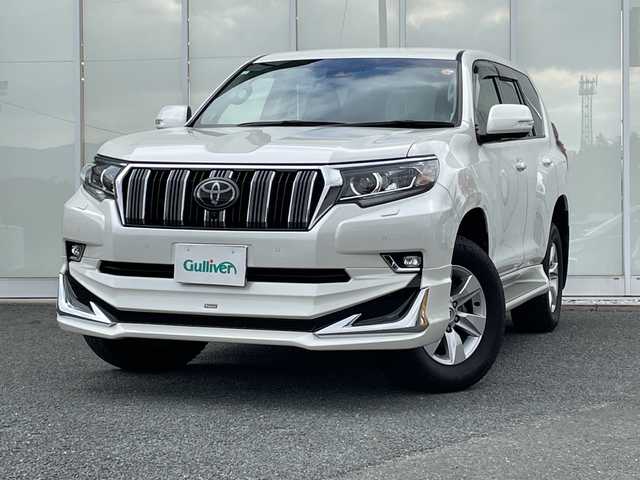 トヨタ ランドクルーザー プラド TX Lパッケージ 福岡県 2021(令3)年 3.6万km ホワイトパールクリスタルシャイン 純正ナビ機能付きディスプレイオーディオ/（AM/FM/USB/BT/Apple CarPlay/フルセグ）/全方位カメラ/モデリスタエアロ（F/S/R)/レーダークルーズコントロール/プリクラッシュセーフティ/ロードサインアシスト/前後コーナーセンサー/レーンキープアシスト/ワンオーナー/ETC2.0/純正フロアマット/レザーシート/D+Nパワーシート/D+N席シートヒーター/エアシート/純正17インチアルミホイール/前後ドライブレコーダー/オートライト/LEDヘッドライト/オートハイビーム