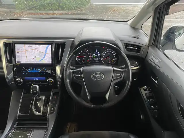 トヨタ アルファード S Cパッケージ 静岡県 2015(平27)年 13.6万km ホワイトパールクリスタルシャイン １オーナー　/サンルーフ/社外ナビ　/地デジ　/Ｂカメラ　/後席モニター　/両側パワスラ/クリアランスソナー/ステアリングスイッチ  /ウッドコンビステアリング　/ステアリングヒーター/オートライト /半革シート　/PWシート　/スペアキー  /保証書/取説　