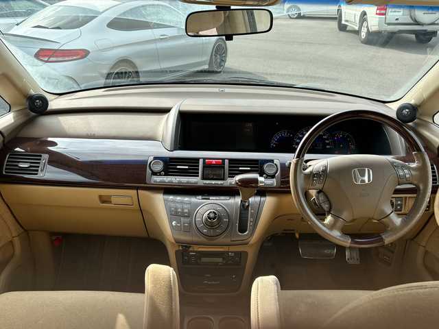 ホンダ エリシオン VX 鹿児島県 2006(平18)年 17.4万km ブルーイッシュホワイトパール フリップダウンモニター/バックカメラ/ETC/ナビ/両側パワースライドドア/パワーシート/リアスポイラー/BBS17インチアルミホイール/AFS/VSA/オートライト/純正フロアマット/スマートキー