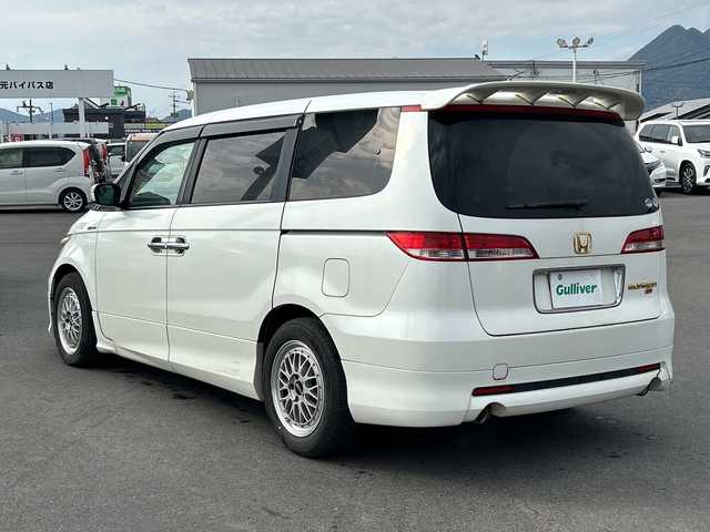 ホンダ エリシオン VX 鹿児島県 2006(平18)年 17.4万km ブルーイッシュホワイトパール フリップダウンモニター/バックカメラ/ETC/ナビ/両側パワースライドドア/パワーシート/リアスポイラー/BBS17インチアルミホイール/AFS/VSA/オートライト/純正フロアマット/スマートキー