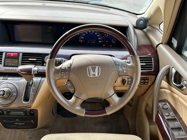 ホンダ エリシオン VX 鹿児島県 2006(平18)年 17.4万km ブルーイッシュホワイトパール フリップダウンモニター/バックカメラ/ETC/ナビ/両側パワースライドドア/パワーシート/リアスポイラー/BBS17インチアルミホイール/AFS/VSA/オートライト/純正フロアマット/スマートキー