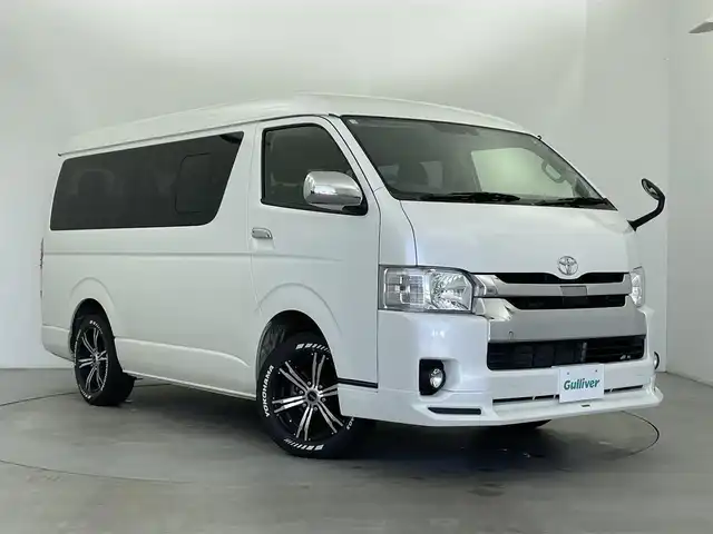 トヨタ ハイエース GL 富山県 2018(平30)年 8.2万km ホワイトパールクリスタルシャイン ワンオーナー/4WD/社外ナビ（AM/FM/CD/DVD/SD/BT）/フルセグTV/バックカメラ/片側パワースライドドア/フロントモデリスタエアロ/衝突被害軽減ブレーキ/レーンキープアシスト/オートマチックハイビーム/RAYS１７インチAW/1500W給電/ビルトインETC/スマートキー×２/純正フロアマット/取扱説明書/保証書