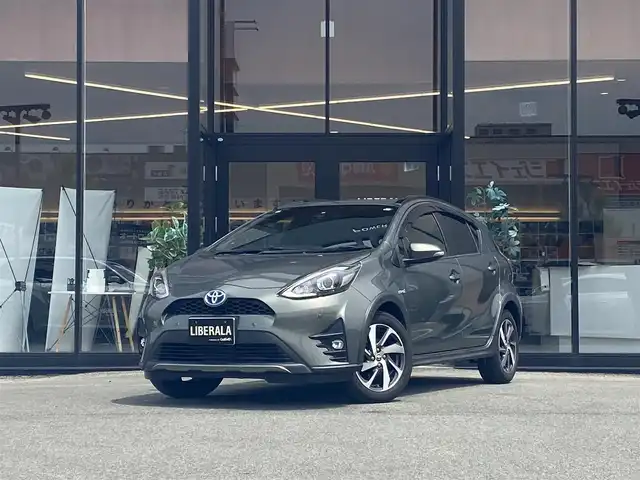トヨタ アクア クロスオーバー グラム 福岡県 2019(令1)年 6.2万km オリーブマイカM ・純正SDナビ/Bluetooth/CD/DVD/・バックカメラ/・ハーフレザーシート/シートヒーター/・ドライブレコーダー/・フルセグ/・ETC/・純正16AW/・プッシュスタート/・アイドリングストップ/・スマートキー/・スペアキー/・レーンキープアシスト/・オートライト/・LEDライト/・保証書/・取扱説明書/・記録簿