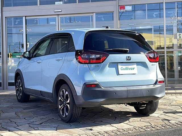 ホンダ フィット e:HEVクロスター 静岡県 2022(令4)年 3万km サーフブルー 純正SDナビ/・CD/・DVD/・フルセグＴＶ/・Bluetooth/・USB/・AM/・FM/主要装備/・衝突軽減/・レーンキープ/・追従クルコン/・コーナーセンサー後/・バックカメラ/・ETC/・ドラレコ前後/・電動パーキングブレーキ/・オートホールド/・純正フロアマット/・純正アルミホイール/・スマートキー/・プッシュスタート/・スペアキー1本/・LEDヘッドライト/・オートライト