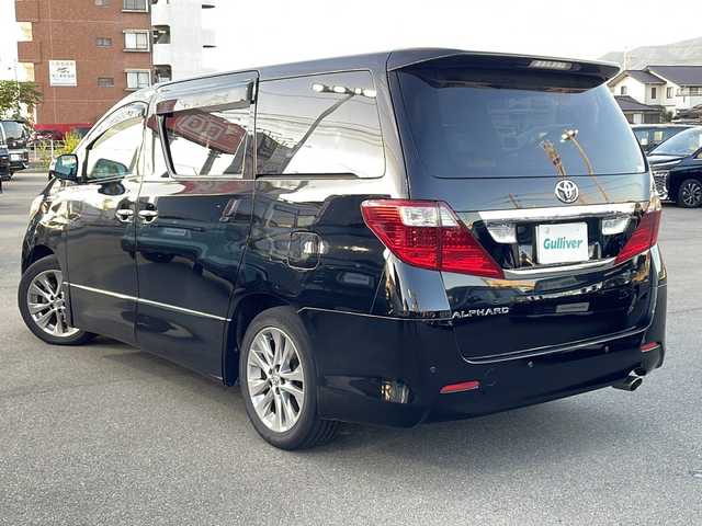 トヨタ アルファード 240S プライムセレクションⅡ 山口県 2011(平23)年 11.3万km ブラック 1/2列目サンルーフ/純正ナビ（フルセグTV、AM/FM、Bluetooth）/フリップダウンモニター/バックカメラ/両側パワースライドドア/パワーバックドア/HIDオートライト/純正18インチアルミホイール/クールボックス/100V充電/2列目オットマン/ETC/前後コーナーセンサー