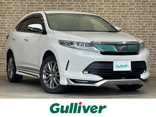 トヨタ ハリアー プレミアム 岩手県 2017(平29)年 12.6万km ホワイトパールクリスタルシャイン ４WD/寒冷地仕様/モデリスタスポイラー/パワーバックドア/トヨタセーフティセンスP/プリクラッシュセーフティ/レーンディパーチャーアラート/レーダークルーズコントロール/アダプティブハイビームシステム/先行車発進告知機能/横滑り防止装置/アイドリングストップ/MTモード付きAT/オートブレーキホールド/社外ナビ/バックカメラ/ETC/LEDヘッドランプ/純正18インチアルミホイール