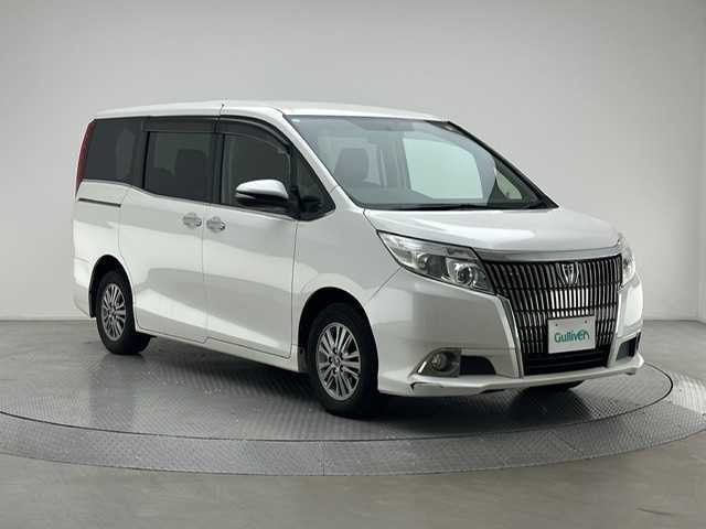 トヨタ エスクァイア Xi 兵庫県 2015(平27)年 6.7万km ホワイトパールクリスタルシャイン 社外ナビ　（AVIC-RW09)/（フルセグ、CD、DVD、BT、MSV）/バックカメラ/ALPINEフリップダウンモニター/両側パワースライドドア/MTモード付AT/ETC/リモコンキー/純正フロアマット/純正ドアバイザー/LEDヘッドライト/ＬＥＤフォグランプ/オートライト
