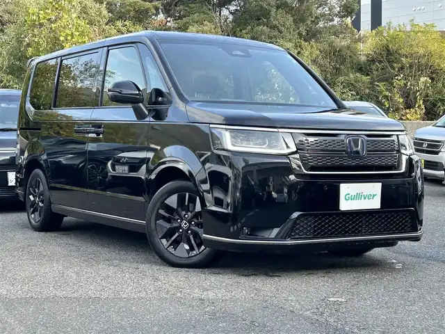 ホンダ ステップワゴン スパーダ eHEV 長崎県 2022(令4)年 4.1万km クリスタルブラックパール 純正ナビ(フルセグTV/BT/FM/CD/DVD/AppleCarPlay/AndroidAuto)/ETC/パワーバックドア/BSM/シートヒーター/ハーフレザーシート/クルーズコントロール/両側パワースライドドア/スマートキー/プッシュスタート/パドルシフト/ステアリングスイッチ