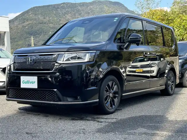 ホンダ ステップワゴン スパーダ eHEV 長崎県 2022(令4)年 4.1万km クリスタルブラックパール 純正ナビ(フルセグTV/BT/FM/CD/DVD/AppleCarPlay/AndroidAuto)/ETC/パワーバックドア/BSM/シートヒーター/ハーフレザーシート/クルーズコントロール/両側パワースライドドア/スマートキー/プッシュスタート/パドルシフト/ステアリングスイッチ