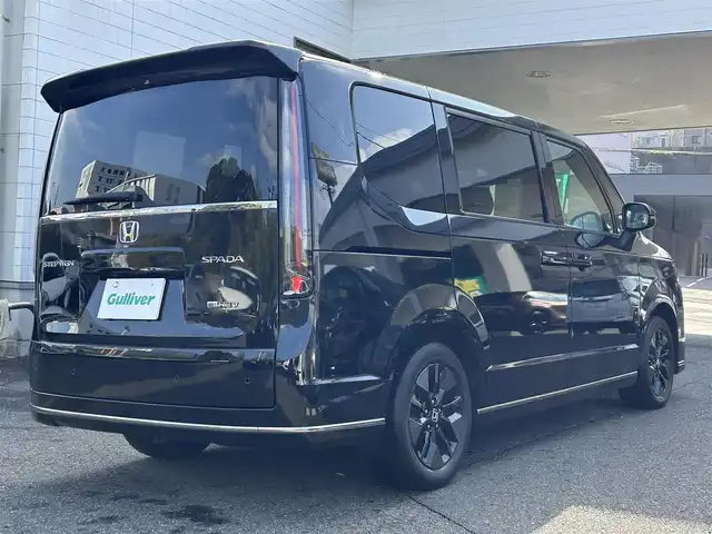 ホンダ ステップワゴン スパーダ eHEV 長崎県 2022(令4)年 4.1万km クリスタルブラックパール 純正ナビ(フルセグTV/BT/FM/CD/DVD/AppleCarPlay/AndroidAuto)/ETC/パワーバックドア/BSM/シートヒーター/ハーフレザーシート/クルーズコントロール/両側パワースライドドア/スマートキー/プッシュスタート/パドルシフト/ステアリングスイッチ