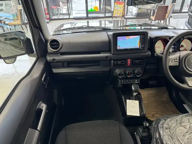 スズキ ジムニー XC 滋賀県 2025(令7)年 0.1万km未満 ミディアムグレー ワンオーナー/イクリプスフルセグナビ/　フルセグ Bluetooth CD DVD SDREC AM FM/バックカメラ/デュアルセンサーブレーキサポート/誤発進抑制機能/車線逸脱警報機能/ふらつき警報機能/ハイビームアシスト/先行車発進お知らせ機能/標識認識機能/エマージェンシーストップシグナル/オートライトシステム/ライト自動消灯システム/ヒーテッドドアミラー/純正LEDヘッドライト/純正16インチアルミ/スマートキー×2/プッシュスタート/保証書/取説/
