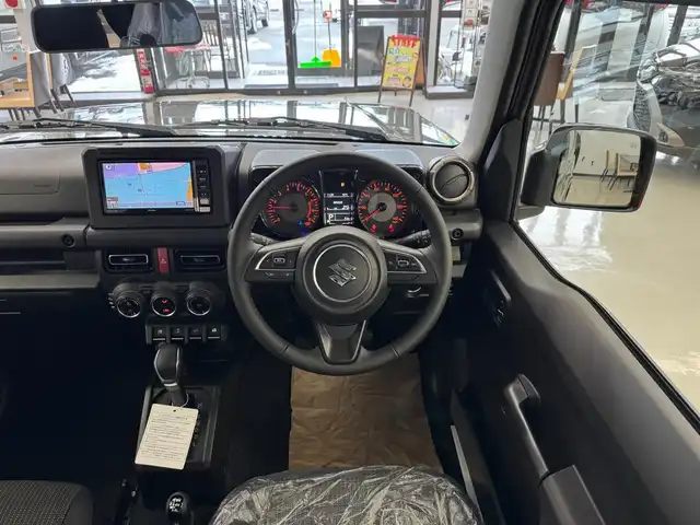 スズキ ジムニー XC 滋賀県 2025(令7)年 0.1万km未満 ミディアムグレー ワンオーナー/イクリプスフルセグナビ/　フルセグ Bluetooth CD DVD SDREC AM FM/バックカメラ/デュアルセンサーブレーキサポート/誤発進抑制機能/車線逸脱警報機能/ふらつき警報機能/ハイビームアシスト/先行車発進お知らせ機能/標識認識機能/エマージェンシーストップシグナル/オートライトシステム/ライト自動消灯システム/ヒーテッドドアミラー/純正LEDヘッドライト/純正16インチアルミ/スマートキー×2/プッシュスタート/保証書/取説/