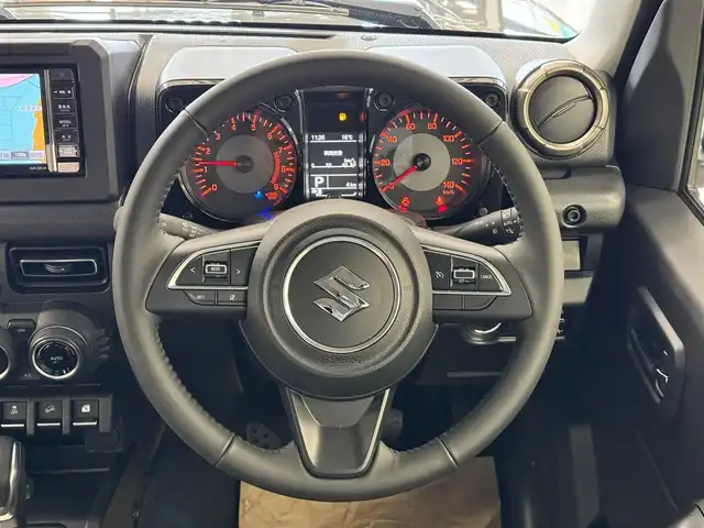 スズキ ジムニー XC 滋賀県 2025(令7)年 0.1万km未満 ミディアムグレー ワンオーナー/イクリプスフルセグナビ/　フルセグ Bluetooth CD DVD SDREC AM FM/バックカメラ/デュアルセンサーブレーキサポート/誤発進抑制機能/車線逸脱警報機能/ふらつき警報機能/ハイビームアシスト/先行車発進お知らせ機能/標識認識機能/エマージェンシーストップシグナル/オートライトシステム/ライト自動消灯システム/ヒーテッドドアミラー/純正LEDヘッドライト/純正16インチアルミ/スマートキー×2/プッシュスタート/保証書/取説/